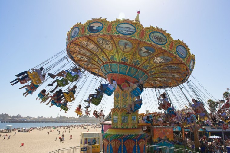 The Santa Cruz Boardwalk has the only oceanfront amusement park on the West Coast with two rides officially recognized as National Historic Landmarks: the hand-carved Looff carousel (built in 1911) and the wood-framed Giant Dipper roller coaster (built in 1924).